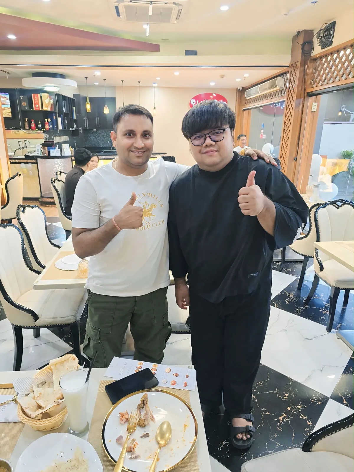 Adam with the owner of Little Asia in General Trias, Cavite